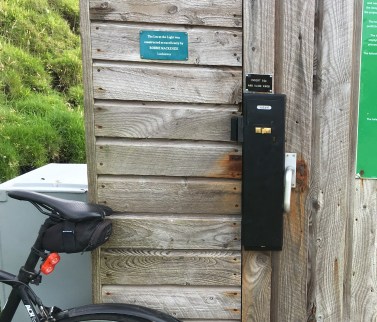 loo at light zoomed on lock and bike and RWM sign